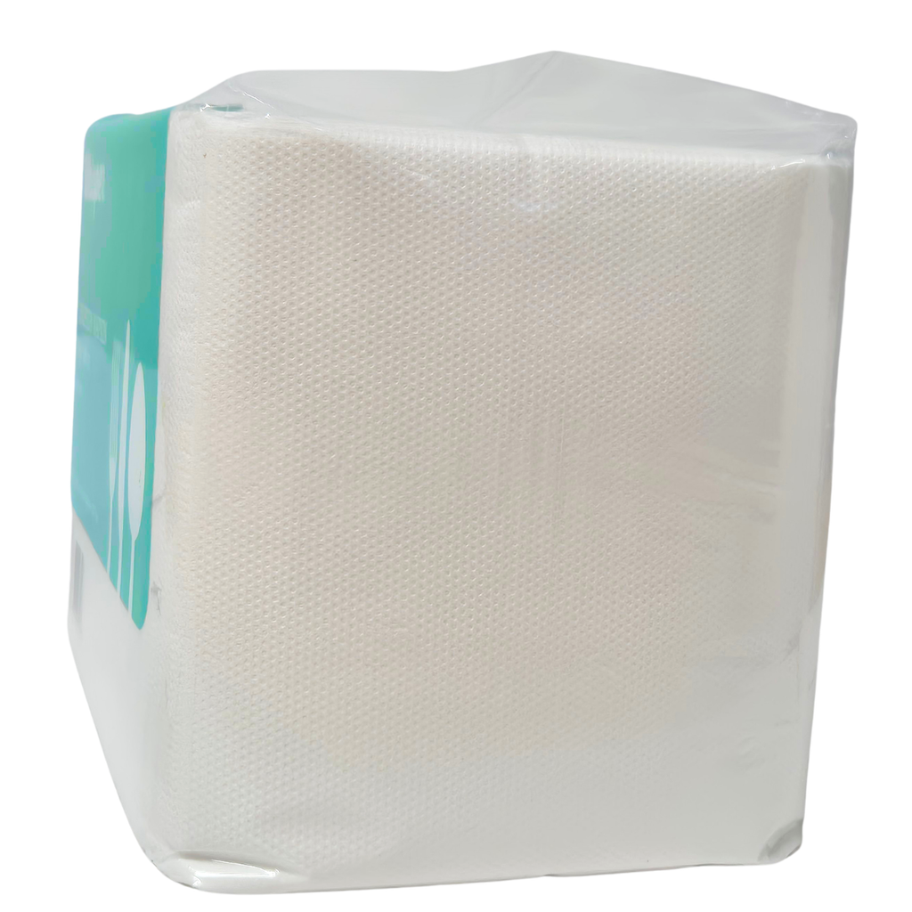A package of Whisper brand white luncheon napkins, 1 ply, containing 500 napkins. The napkins are wrapped in clear plastic. QT folded napkins. Dot embossing