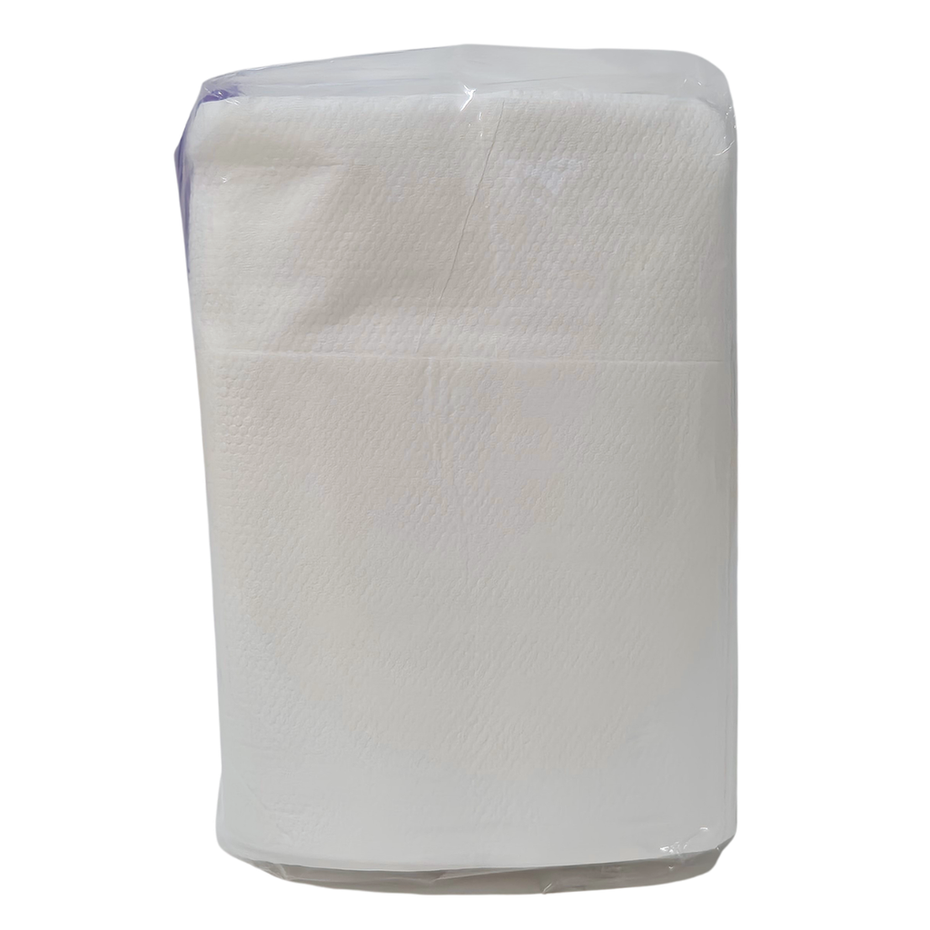 A package of Whisper brand white dispenser napkins in a clear plastic wrap with a purple label, photographed on a white background. D fold napkin, 500 napkins in a pack, 1ply.